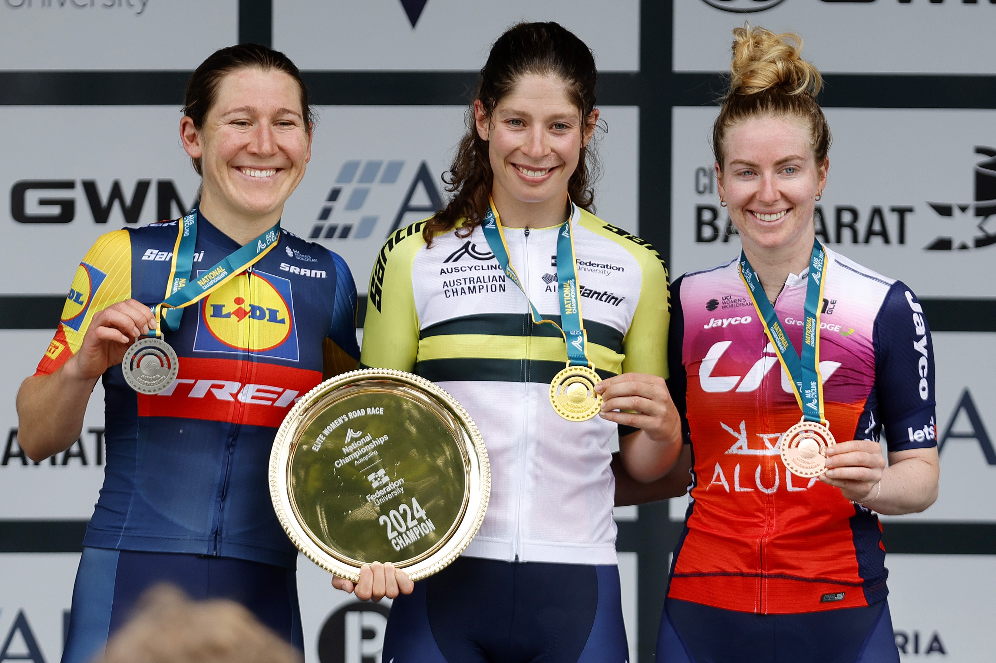 Australian cyclists Lauretta Hanson, Ruby Roseman-Gannon and Alexandra Manly on the podium of the elite women's road race at the 2024 Federation University AusCycling Road National Championships, Ballarat